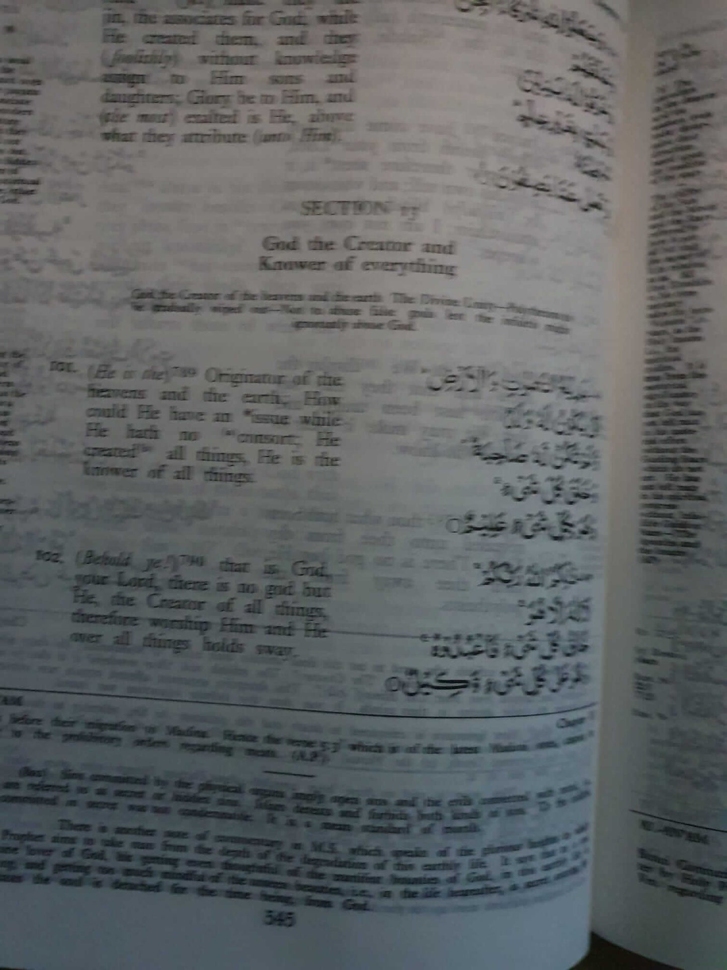 The Holy Qur'an - Arabic text with English translation and commentary